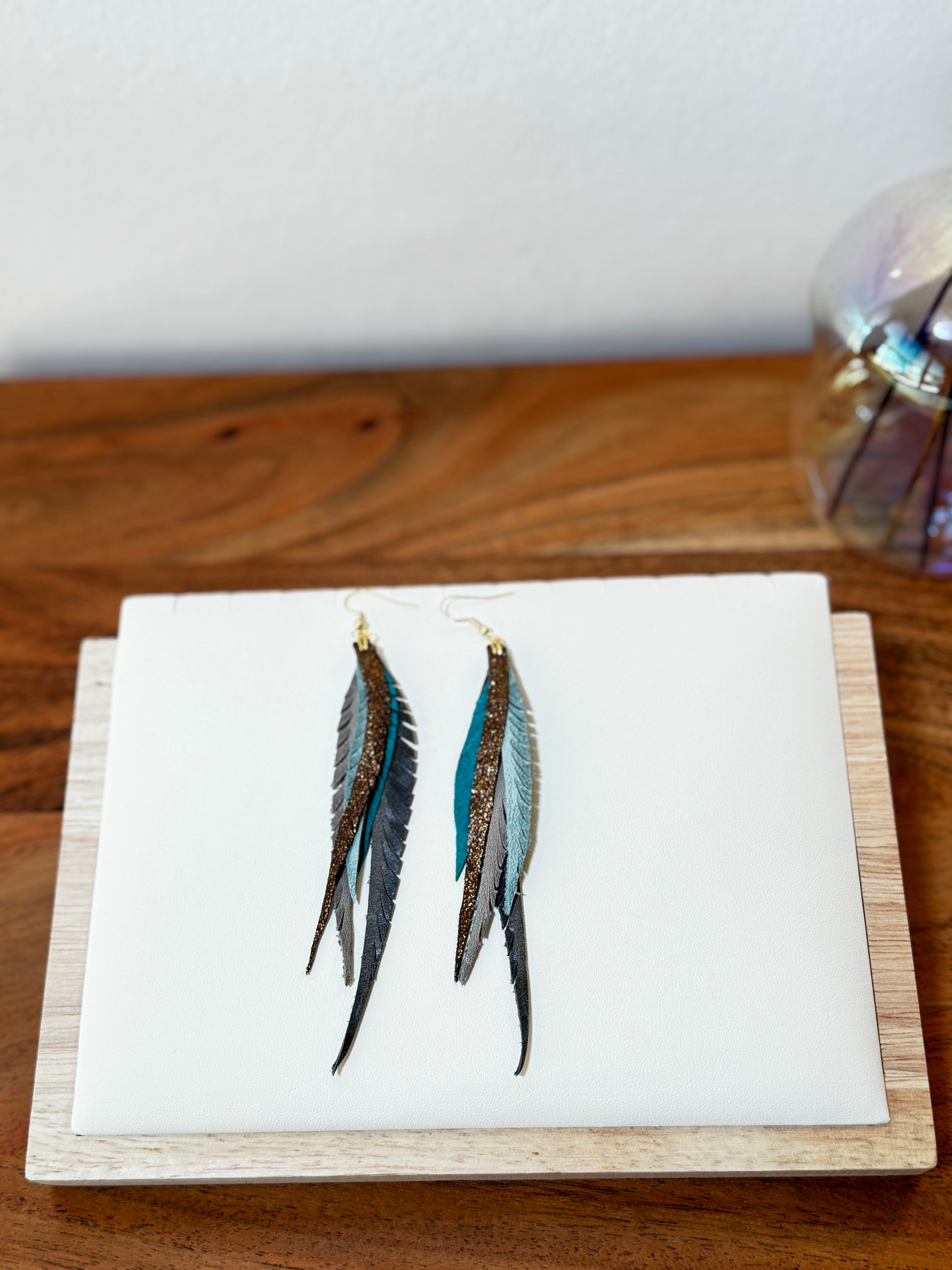 Boucles d'oreilles plumes en cuir